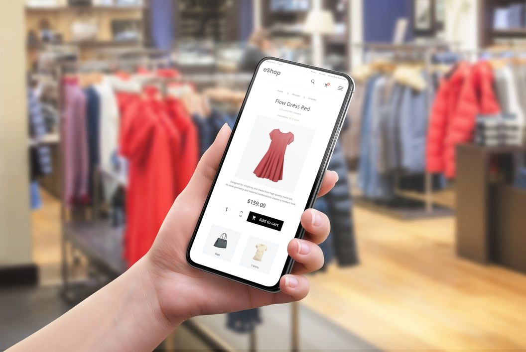 Customer comparing a product in store with her smartphone