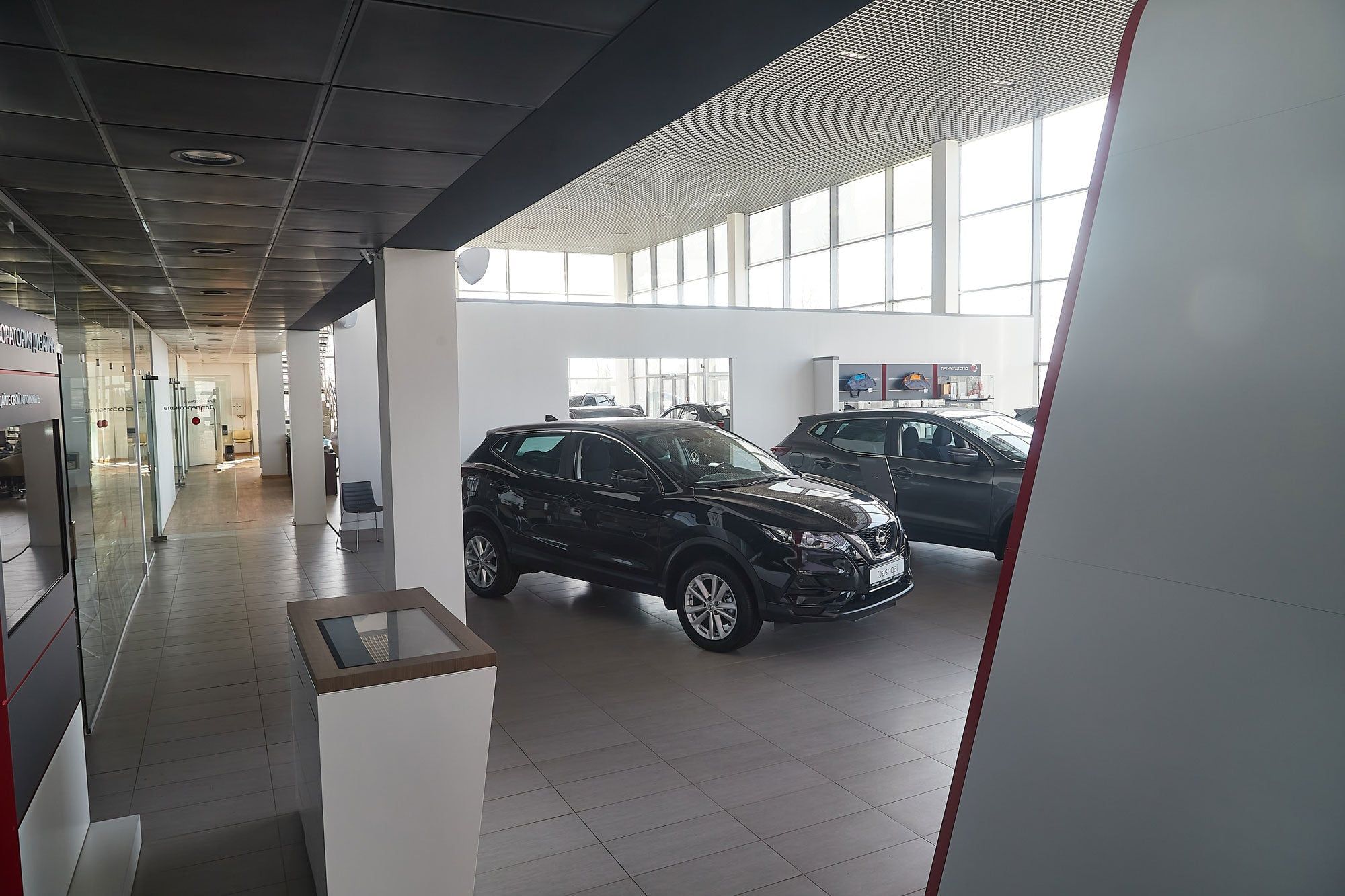 Interactive kiosk in a car dealership showroom