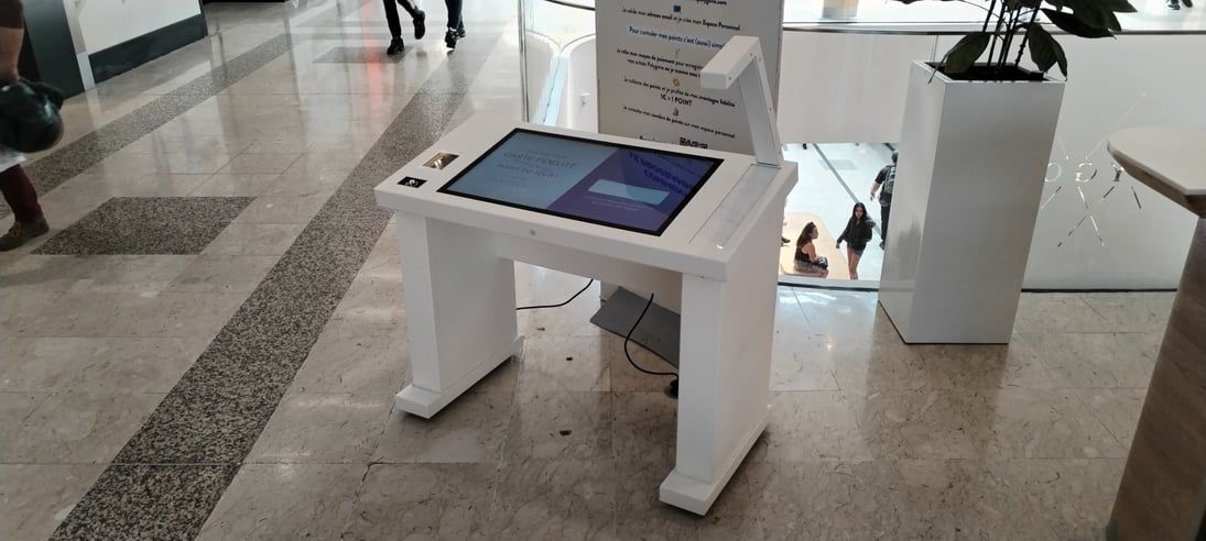Interactive touch table terminal in the Polygone Montpellier shopping center