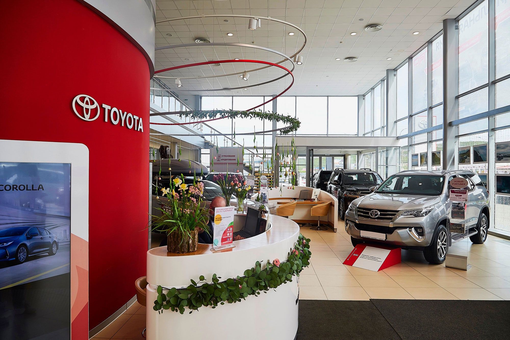 Digital displays in a car dealership showroom