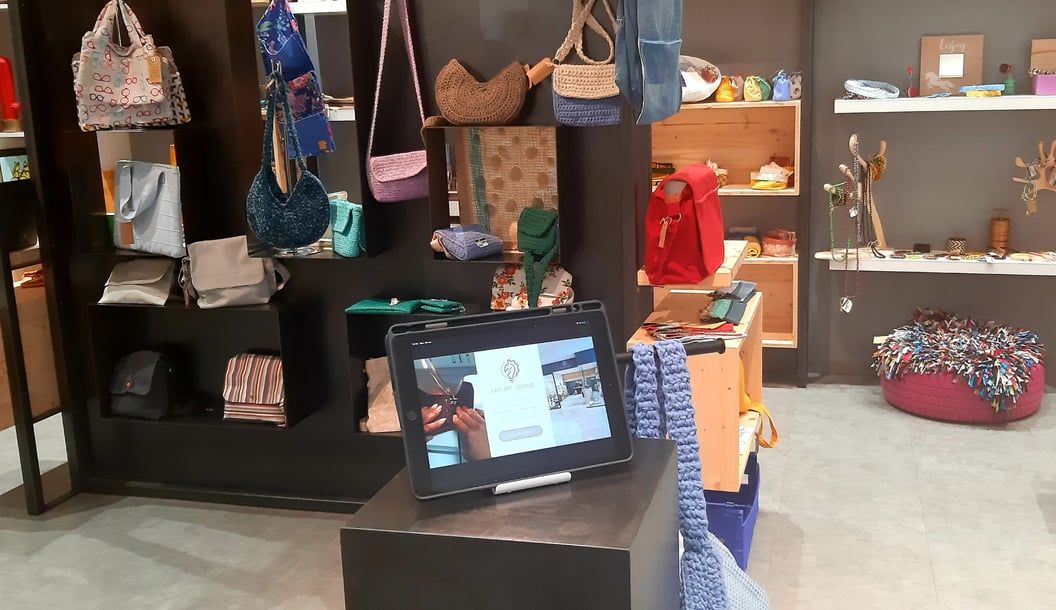 Interactive digital signage on a touch tablet in the La Fabrik du Sud store