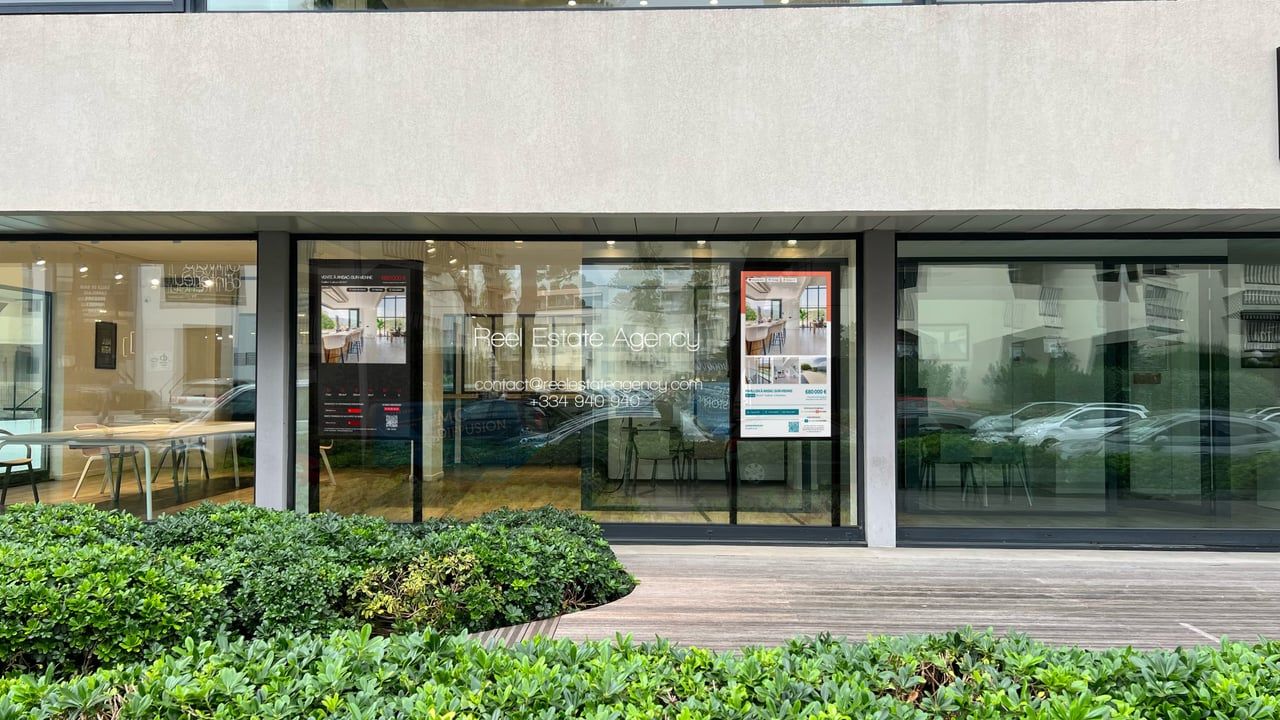 A real estate agency's glass storefront